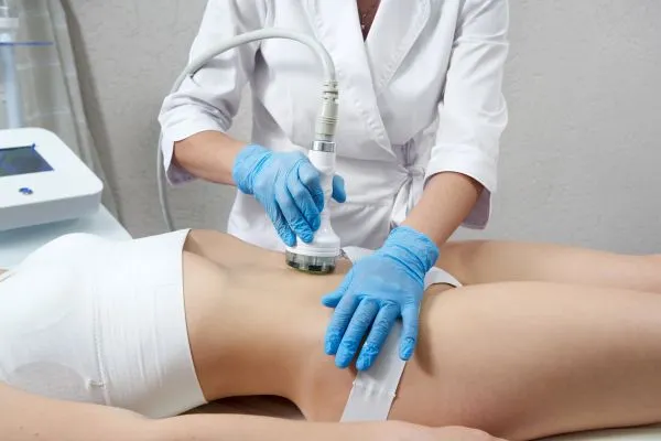 woman having HIFU treatment on her stomach to combat loose skin Croydon following weight loss